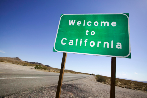 A sign that says welcome to California.